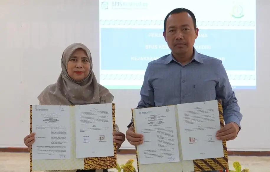 : Kepala BPJS Kesehatan Cabang Kediri, Tutus Novita Dewi dan Kepala Kejaksaan Negeri Kabupaten Blitar, Lie Putra Setiawan.  (Ist). 