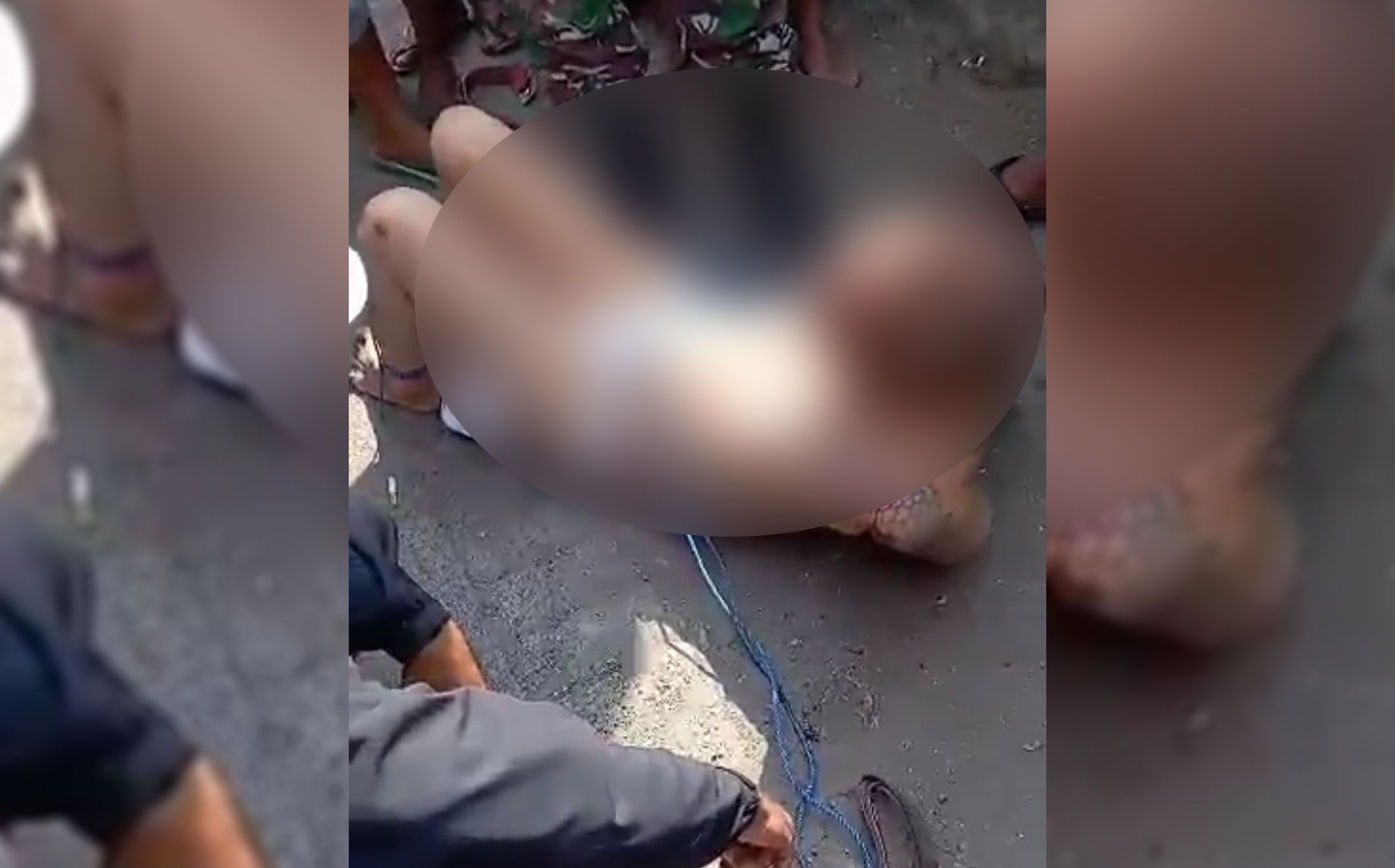 Hamzah Asnawi (48) dihajar massa di Jalan Raya Dukuh Tengah, Buduran, Sidoarjo