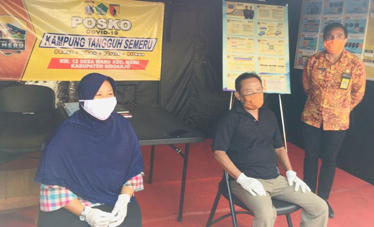 Dua pasien Covid-19 di Sidoarjo yang dinyatakan sembuh saat menyampaikan testimoni.