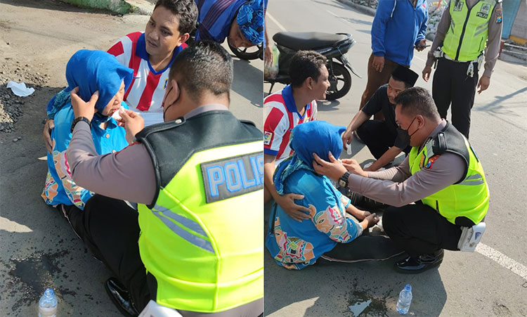 Gerak Cepat Polisi Mojokerto saat terjadi kecelakaan tunggal di Jalan Brawijaya, tepatnya di depan SD Muhammadiyah, Senin (15/08/2022).