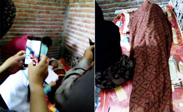 Korban banjir saat dibawa ke rumah duka.