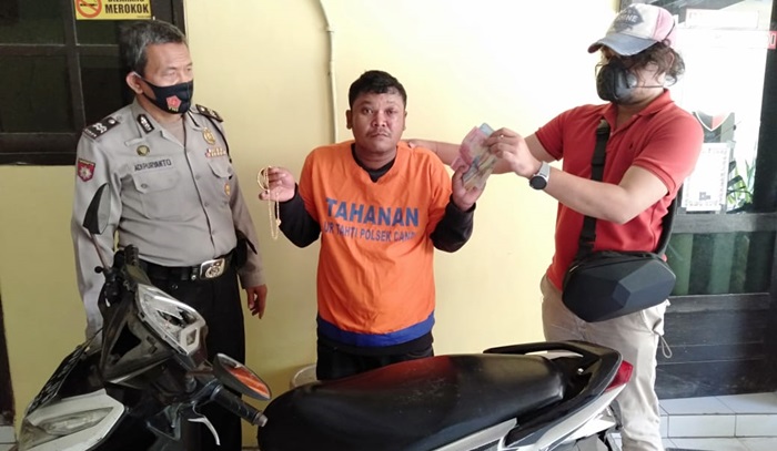 Tersangka Budi Santoso bersama barang bukti hasil kejahatannya.